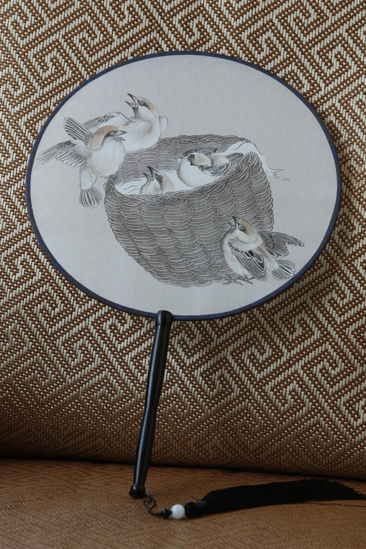 Hand-painted silk fan with nesting sparrows